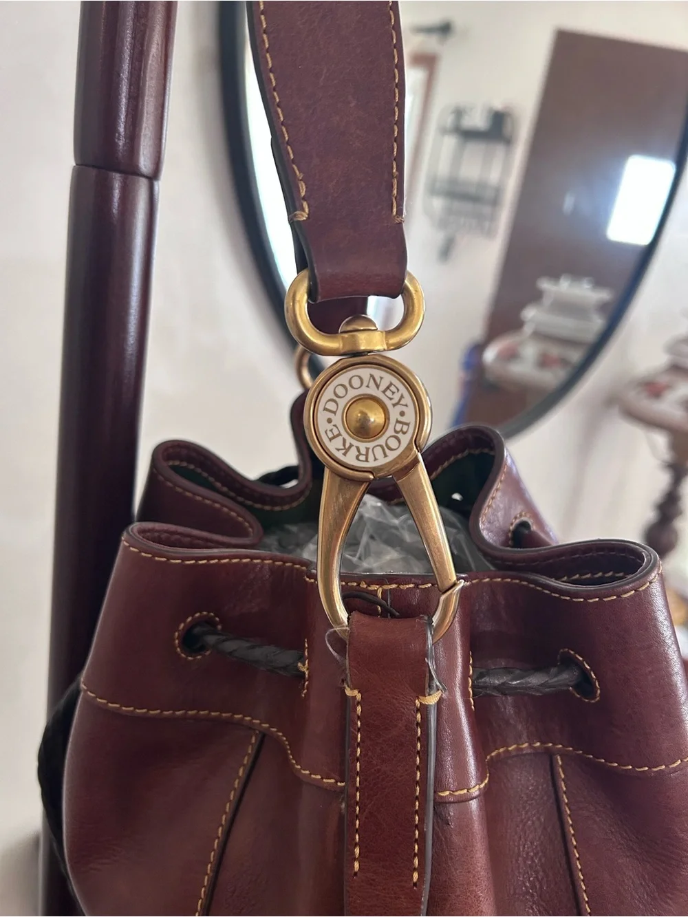 Donney and Brooke Chestnut florentine leather Hattie draw string bucket bag.